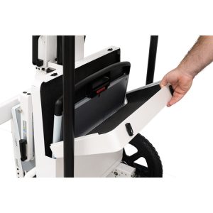 Close-up of a hand inserting a detector panel into the Acuity PDR's side storage slot