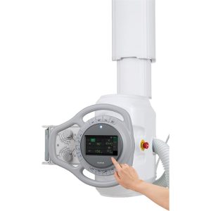 Close-up of a hand adjusting the Fujifilm FDR Clinica ceiling-suspended tube head touchscreen control panel