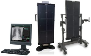 Fujifilm FDR D-EVO GL system showing a review monitor with a chest X-ray next to the detector mounted on its mobile stand and stationary wall stand