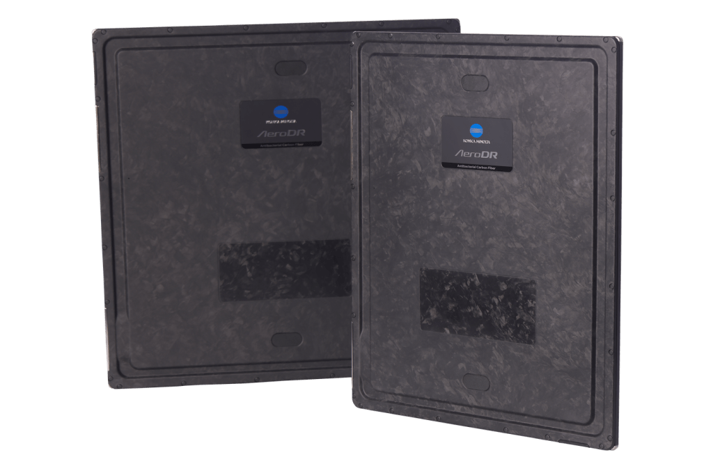 Two AeroDR Glassless carbon fiber detector panels shown at an angle with Konica Minolta AeroDR branding