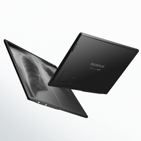 Fujifilm FDR SE Lite wireless detector shown at an angle with a chest X-ray image layered beside it