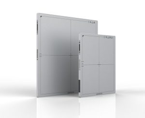 Two Vieworks Vivix-N flat panel detectors of different sizes, standing side by side