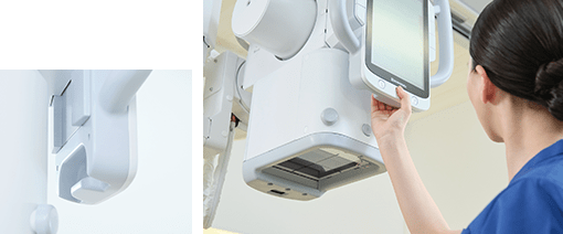 Close-up of the RADspeed Pro SR5 tube head with a technologist adjusting the touchscreen display