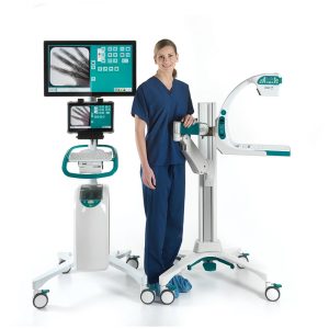 Close-up of the Smart C mini C-arm fluoroscopy system with a tablet monitor and foot pedal