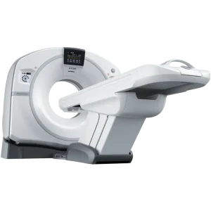 GE Revolution EVO CT scanner shown at an angle with the patient table extended through the gantry bore
