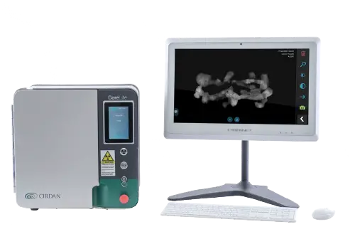 CoreLite bone densitometer scanner unit next to a Cybernet display monitor showing a scanned bone image