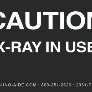 Black illuminated caution sign reading "CAUTION X-RAY IN USE"