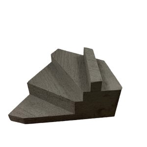 Dark gray closed cell foam wedge sponge for left lateral finger block positioning