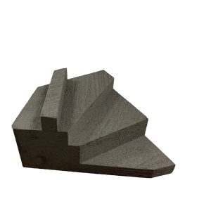 Dark gray closed cell foam wedge sponge with an angled step for right lateral finger block positioning