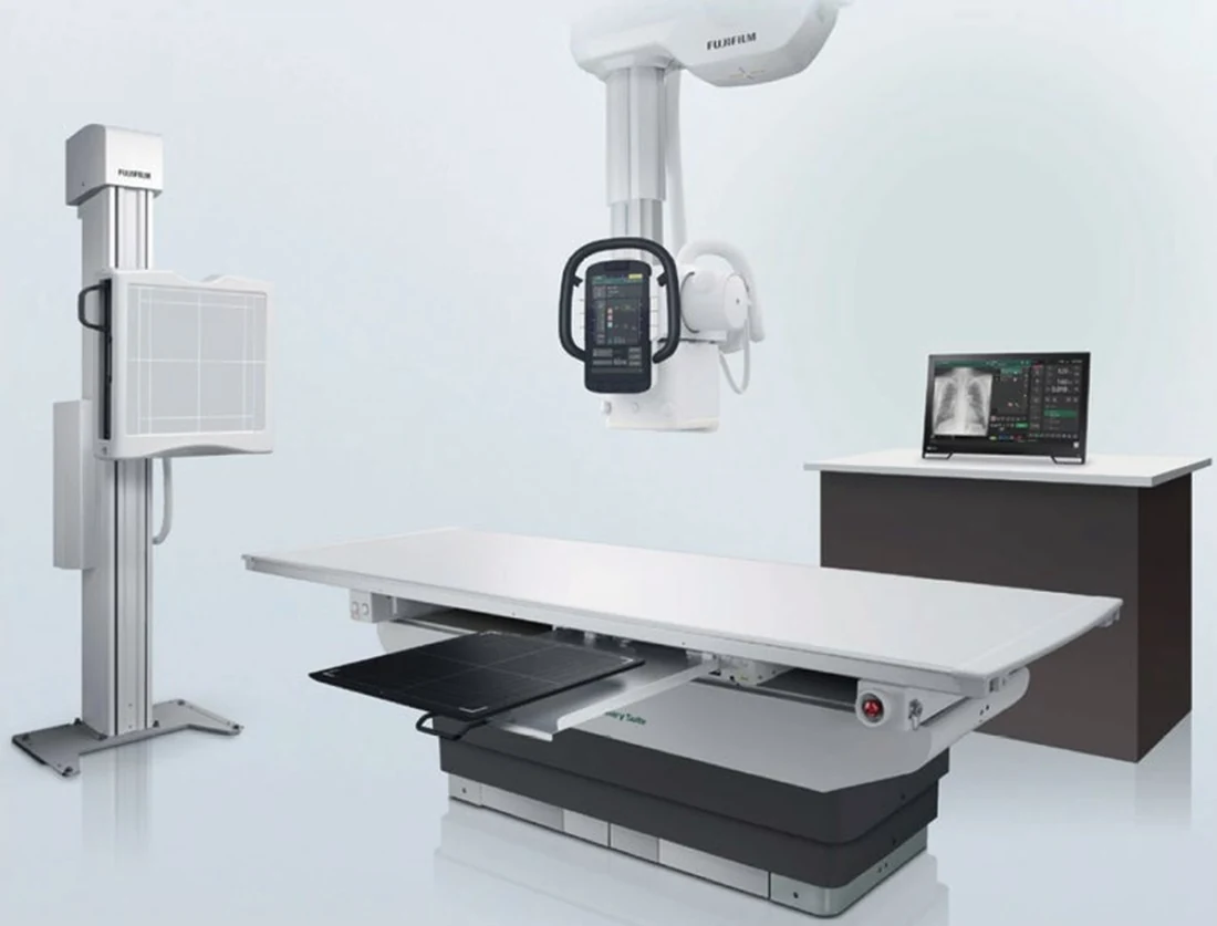 FDR Visionary Suite digital radiography room with ceiling mounted tube, upright stand and motorized table